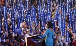 Barack Obama's wife, Michelle Obama, addresses the Democratic National Convention in Denver. Photograph: Stephan Savoia/AP