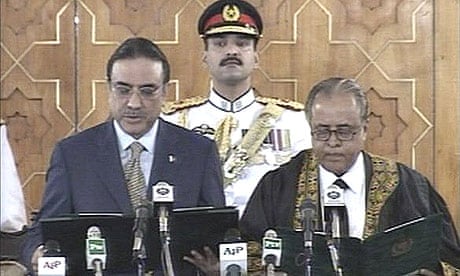 Asif Ali Zardari (l), the widower of former Pakistani prime minister Benazir Bhutto, is sworn in as president in Islamabad in this TV grab.