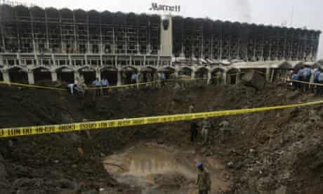 A crater left by a bomb outside the Marriott hotel in Islamabad