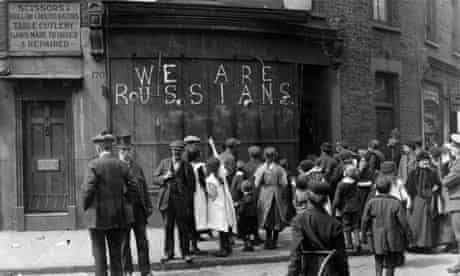 A sign chalked on the front of a shop in the east end of London assures people in 1915 that the business is Russian-owned
