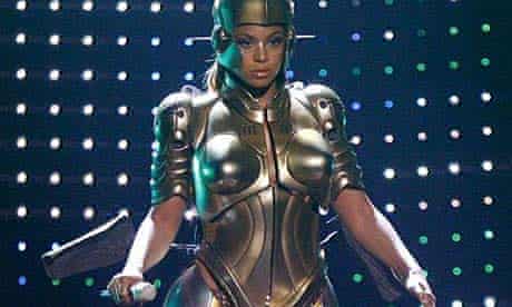 Beyonce on stage wearing a robot costume 