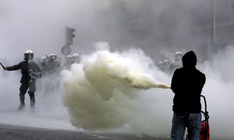 Youngsters clash with Greek riot police in the centre of Athens