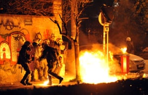 Gallery Riots in Athens: Riot police avoid fire bombs outside Aristotle University  in  Thessaloniki