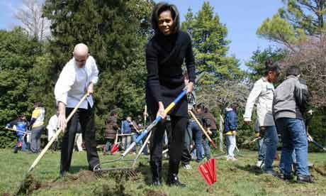 Michelle Obama joins students from Bancroft Elementary School during a groundbreaking ceremony for the new White House Kitchen Garden in Washington. Photograph: Jason Reed/Reuters