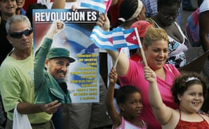 A man holds up a photograph of Cuba's retired leader Fidel Castro during the May Day parade at Havana's Revolution Square