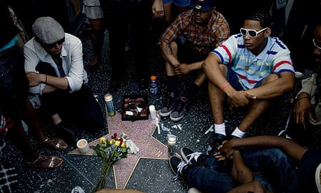 Fans of pop star Michael Jackson mourn at his star on the Hollywood Walk of Fame 