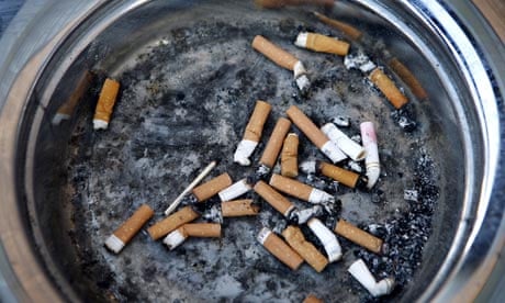 Cigarette butts in the designated smoking area outside Mecca Bingo, Acocks Green, Birmingham.