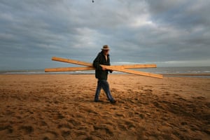 Gallery planks in Ramsgate: Locals collecting planks that were washed up on Ramsgate beach