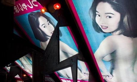 Peep show signage in Tokyo's red light district of Kabukicho