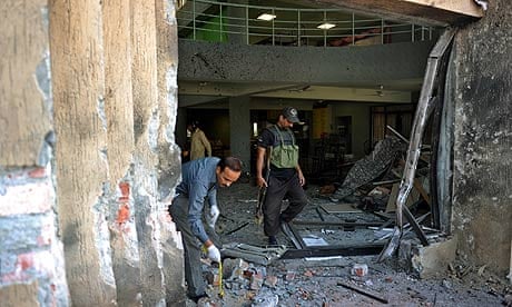 Investigators at the scene of a suicide blast in Islamabad
