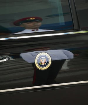 Obama in Asia: a ceremonial guard is reflected in u.s. president obama's car 