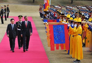 Obama in South Korea: President Obama and President Lee Myung-bak inspect an honour guard