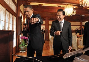 Obama in South Korea: President Barack Obama displays his skills in the martial art of taekwondo