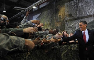 Obama in South Korea: President Barack Obama greets US troops at Osan Air Base, south of Seoul