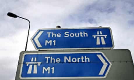 A sign at Junction 26 of the M1 motorway pointing North and South