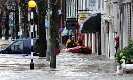A flooded Cockermouth high street, in Cumbria