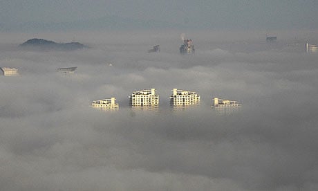 Highrise buildings seen above the fog in Wenling, China