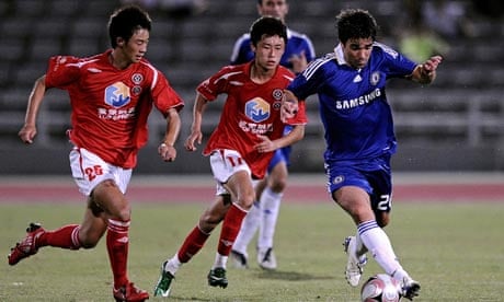 Chelsea's Deco is chased by Chengdu Blades' Xia Qiqi and Zhang Yuan