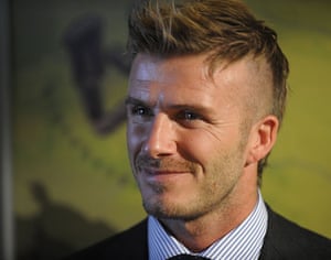David Beckham hair: December 2009: David Beckham speaks to the press  in Cape Town