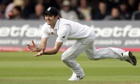 England's James Anderson dives for the catch to dissmiss South Africa's Paul Harris