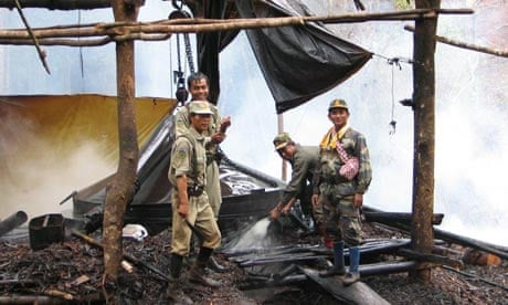 Cambodian rangers destroy a sassafras distillery