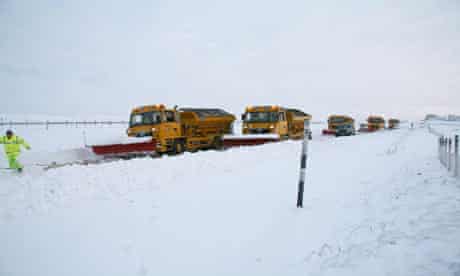 snow brings second day of travel havoc uk weather the guardian