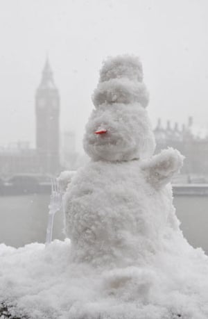 Gallery Snowman gallery: London: a snowman in front of the Houses of Parliament.
