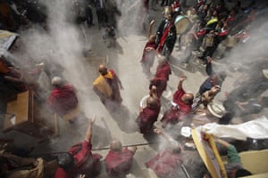 Kathmandu Uprising day: Tibet monks perform rituals during their prayer meeting in Kathmandu.