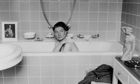 Lee Miller posing in Hitler's bathtub