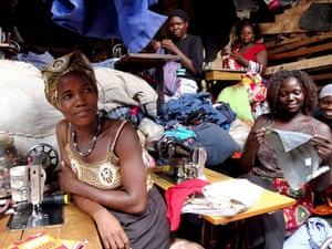 Owino market fire: Women using sewing machines at Owino market in Kampala, Uganda.