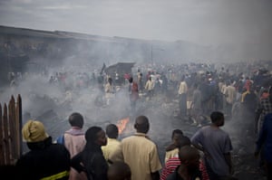 Owino market fire: Traders try to salvage some of their goods in Owino market, Uganda.