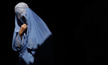 A burqa-clad Afghan woman 