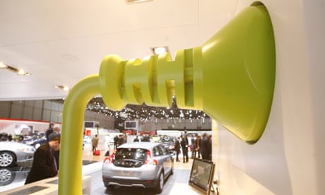 A giant electric car plug at the Volvo stand during  the 79th Geneva Car Show in Geneva