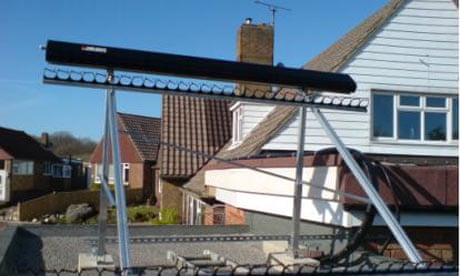 A solar hot water frame on the flat roof of Ann Link's home