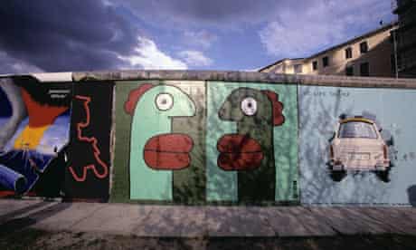 Thierry Noir head painting on the Berlin Wall