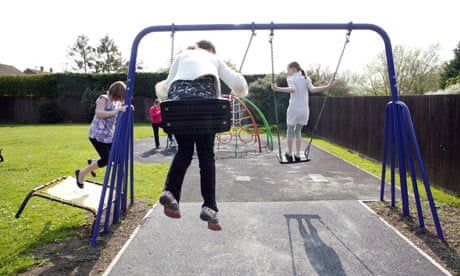 Children and staff in the playground of a children's home in Chelmsford, Essex