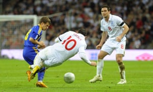 Hot headed Rooney: Rooney makes a reckless tackle on Oleksandr Aliiev