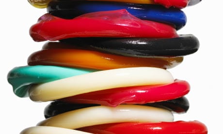 Stack of multi-colored condoms