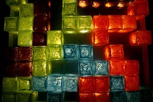 Tetris 25th anniversary: Glass cubes placed on a board to form shapes from the game Tetris