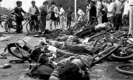 Bodies of dead civilians lie among mangled bicycles near Beijing's Tiananmen Square, 4 June 1989