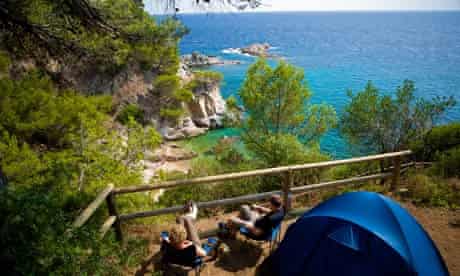 The beach campsite in Cala Llevado, Spain