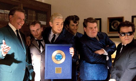 Con O'Neill as Joe Meek celebrates chart success with his young pop stars in the film 'Telstar'