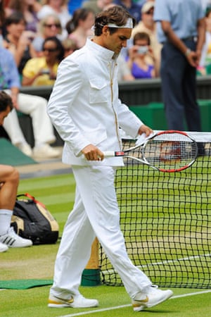friday wimbledon: Roger Federer walks on for court for a knock up