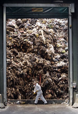 Garbage: An employee works inside the Caivano dump, near Naples, southern Italy