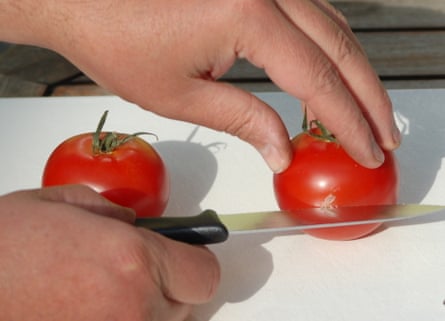 Slice the tomatoes in half