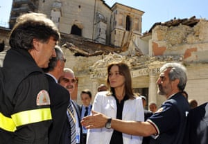 G8 gallery: Carla Bruni-Sarkozy surveys earthquake damage