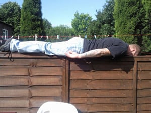 Facedown: Facebook lying down game on the garden fence