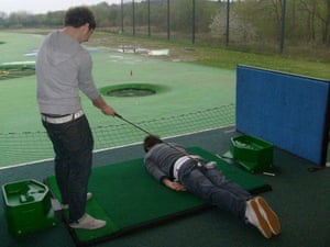 Facedown: Facebook lying down game at a driving range