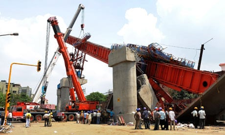 The site where a pillar supporting a new bridge for the Delhi metro collapsed