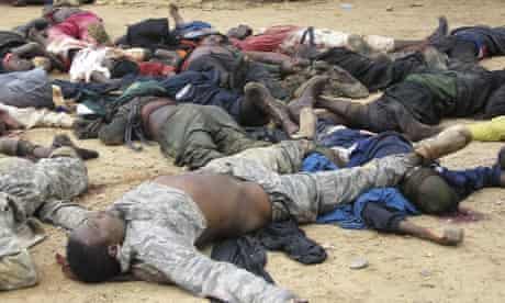 Dead Nigerians are brought to a police station in the northeastern city of Bauchi